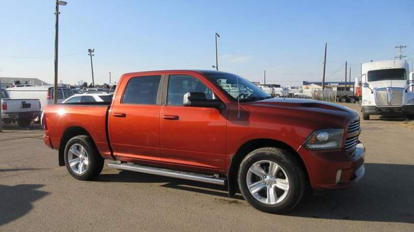 2013-ram-1500-4wd-crew-cab-57-ft-box-sport-big-1