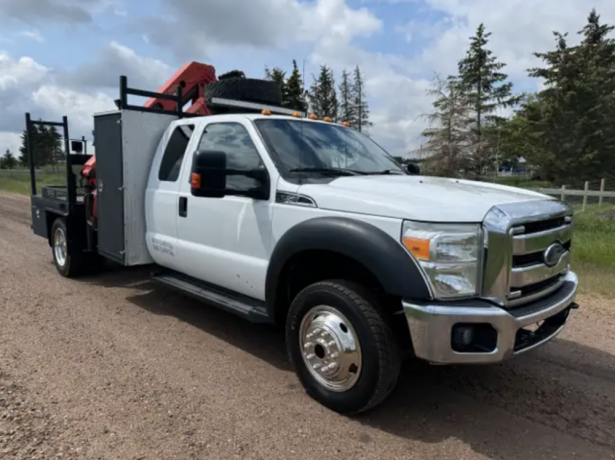 2012-ford-f550-ext-cab-4x4-picker-boom-truck-palfinger-11020lbs-big-1