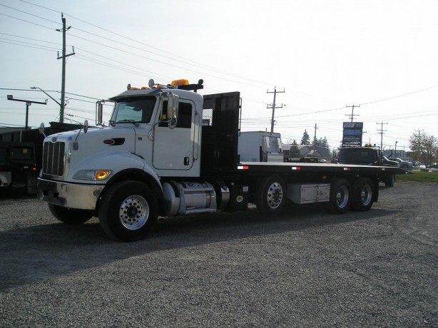 2015-peterbilt-348-tri-axle-roll-off-big-1